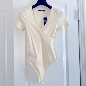 Ivory Ribbed Vneck Bodysuit